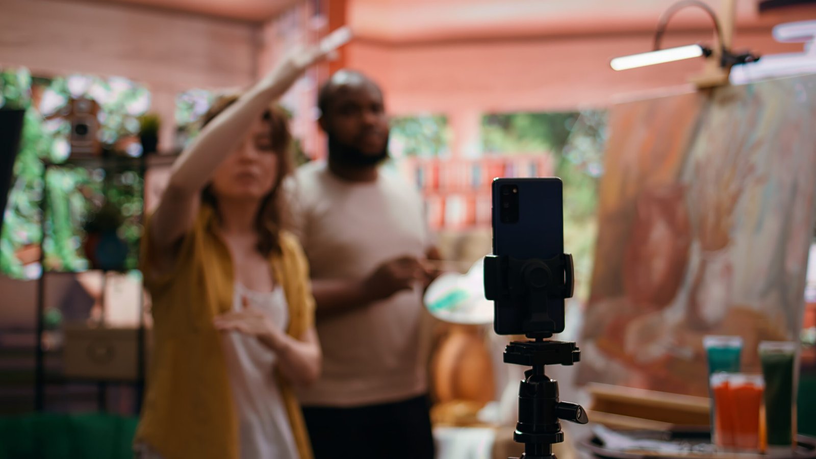 Couple filming content for an online tutorial