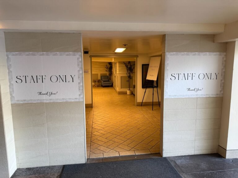 Staff only entrance wayfinding signage